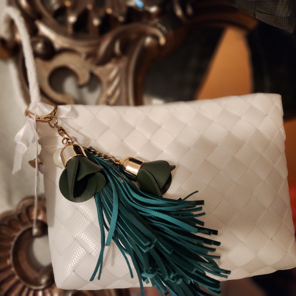 Elegant White Clutch with Green Tassel